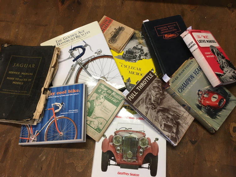 Gunn and co showroom vintage bicycle and car books, art and photos.