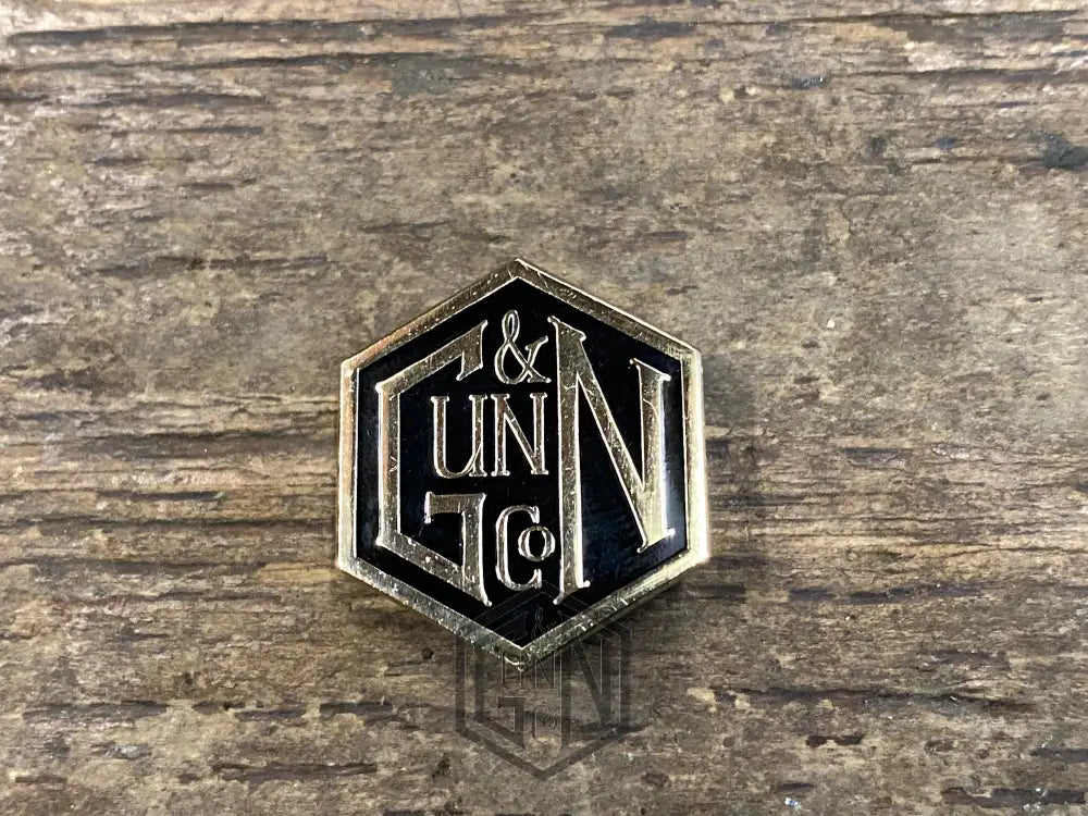 Gunn & Co Gold And Black Enamel Lapel Pin Badge. Badge